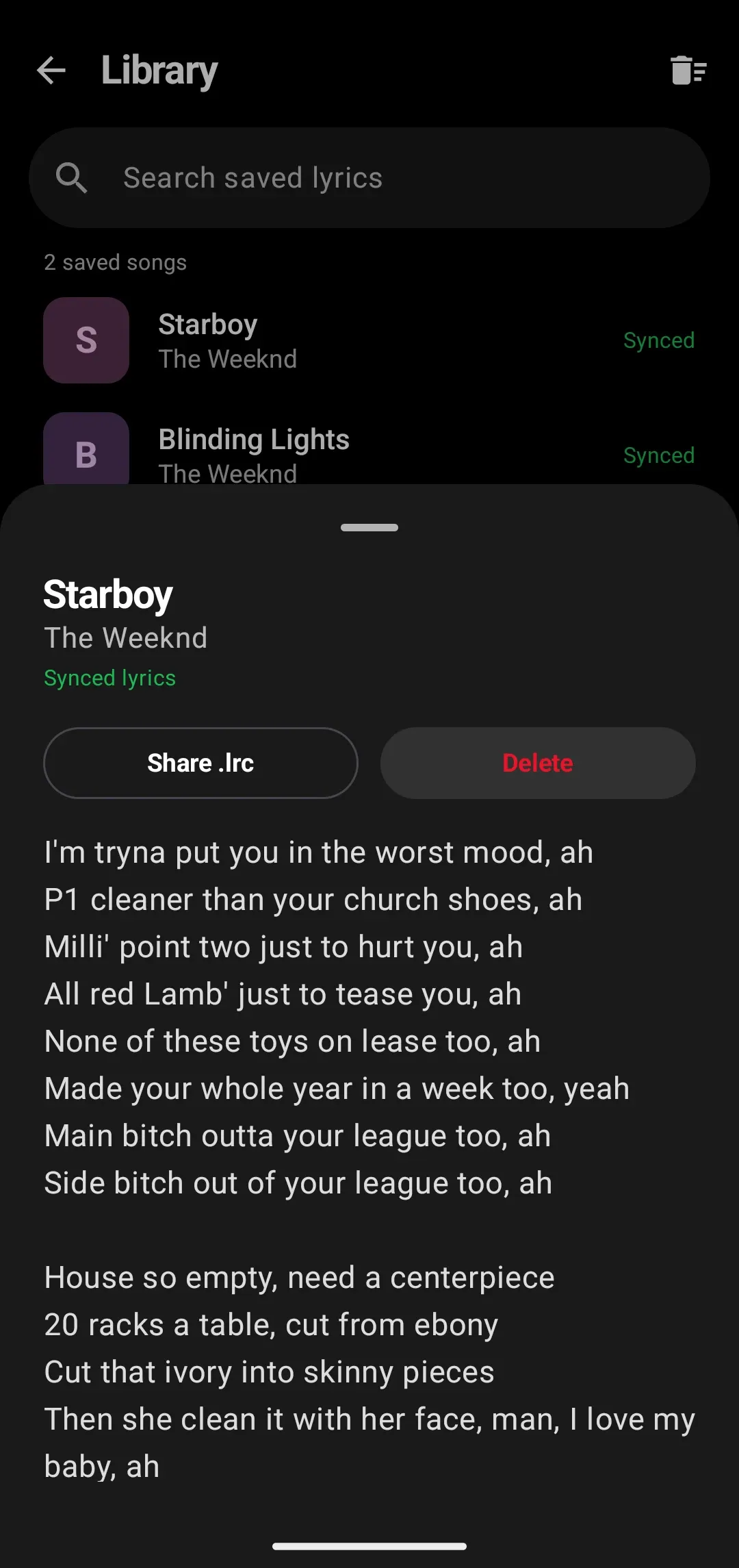 A saved song opened as a sheet, with Share .lrc and Delete buttons above its lyrics.